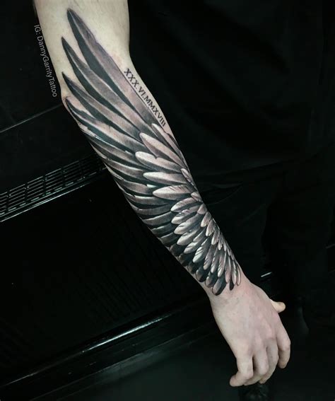 forearm wing tattoo designs